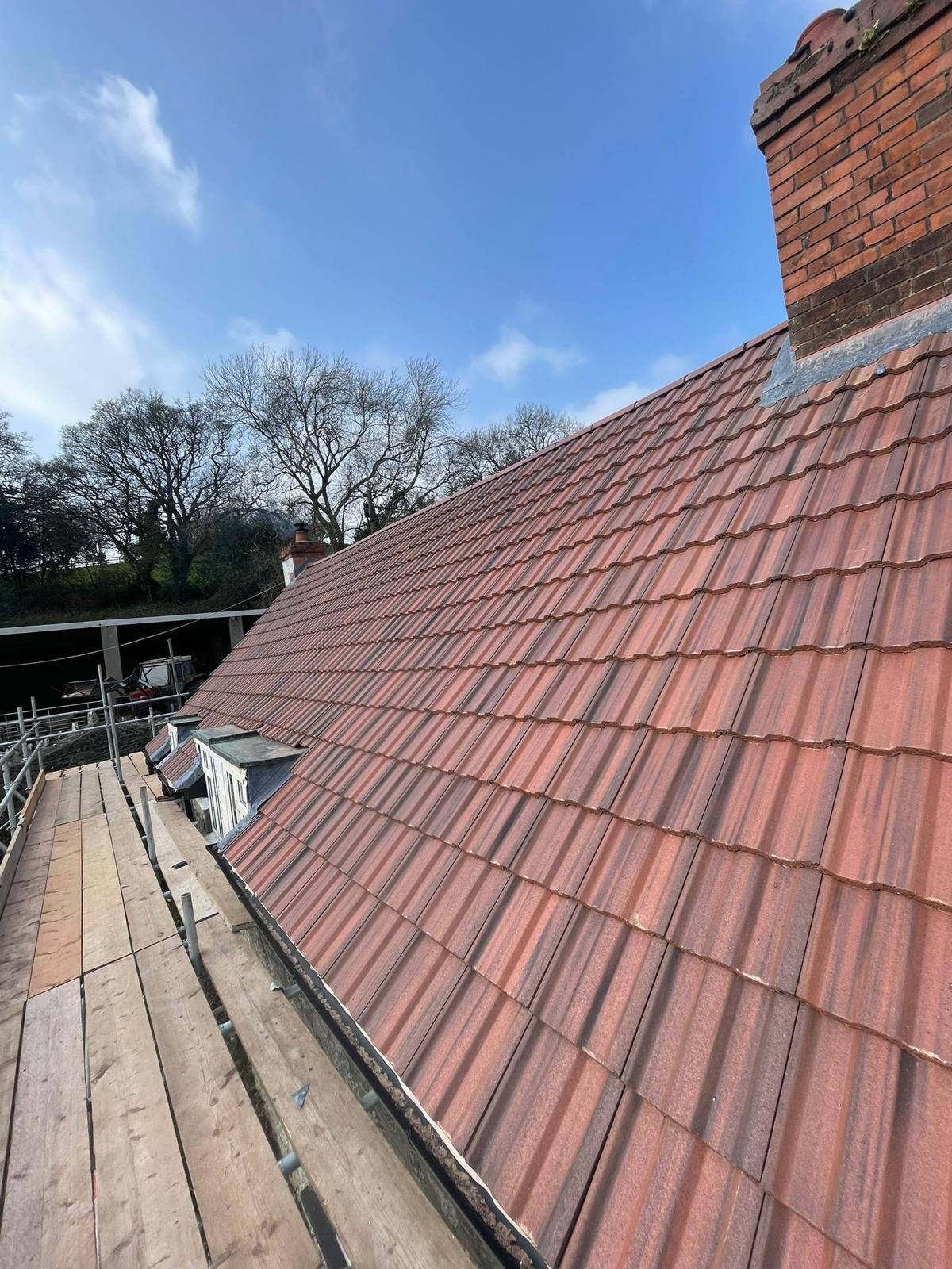 New Marley Acme double Roman clay tile roof with fresh chimney leadwork